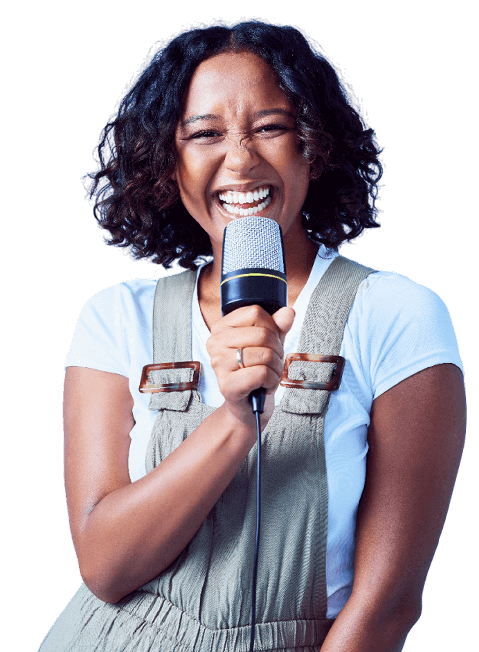 A woman holding a microphone up to her mouth.