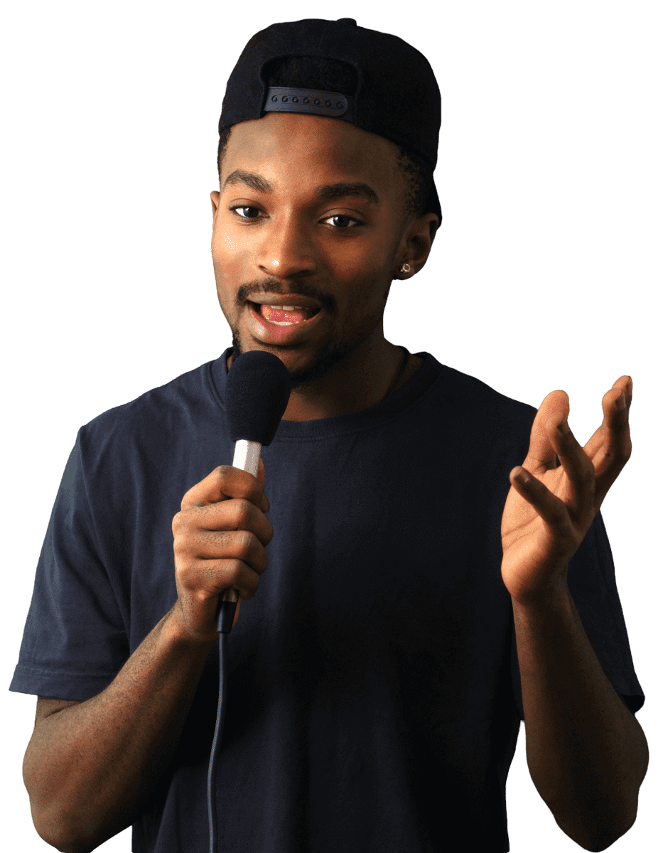 A man holding a microphone and wearing a black shirt